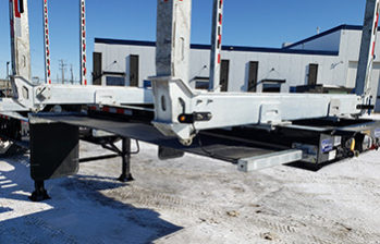Deloupe quad axle log trailer bunks and stakes