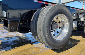 Deloupe quad axle log trailer fourth axle