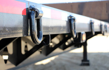 Gincor Trailer Werx step deck trailer with air ramps frame